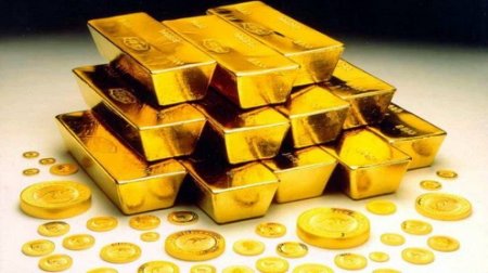 Золото прибавляет в цене благодаря ослаблению доллара